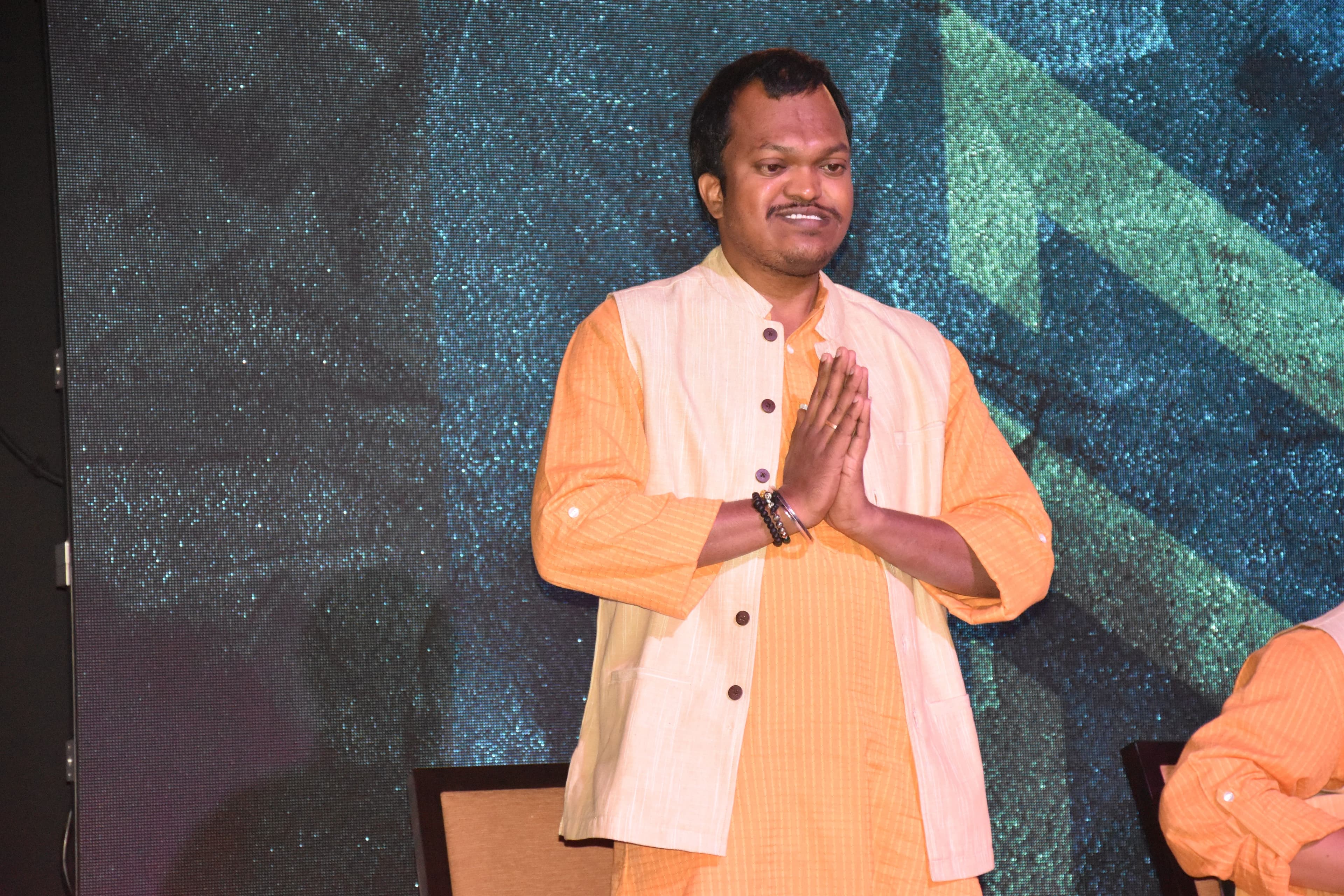 A portrait of Ashok, a member of the Sunadha Band.