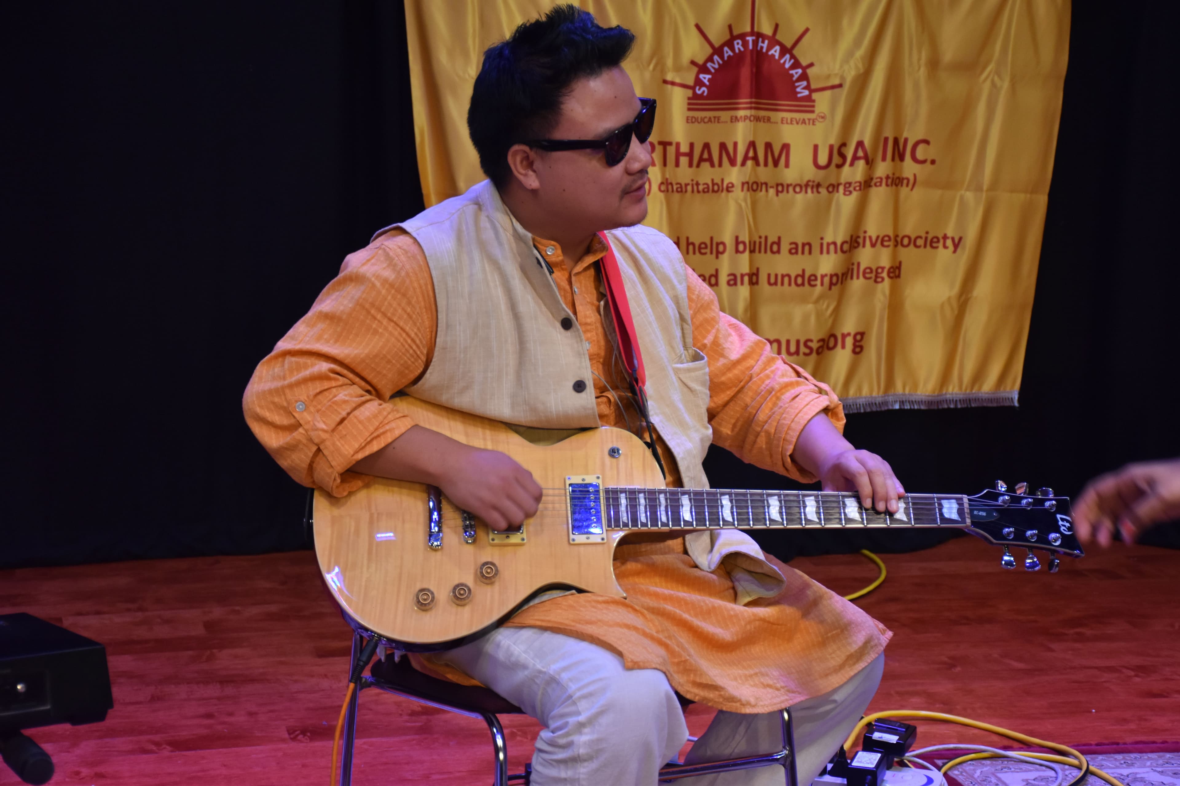 A portrait of David Zeme, a member of the Sunadha Band.