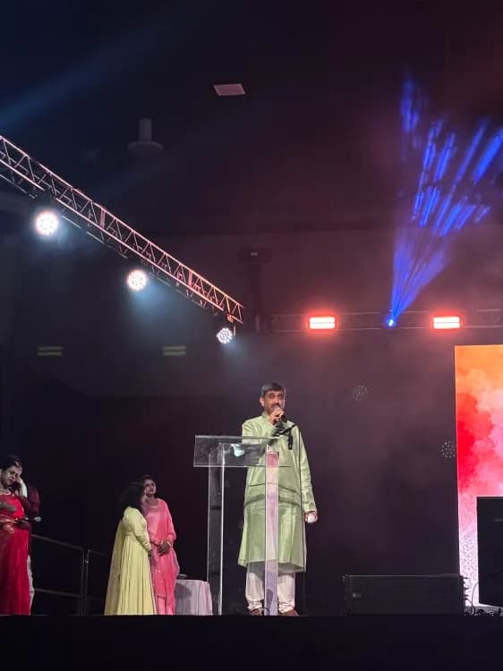 Dr. Mahantesh on the stage, addressing the crowd